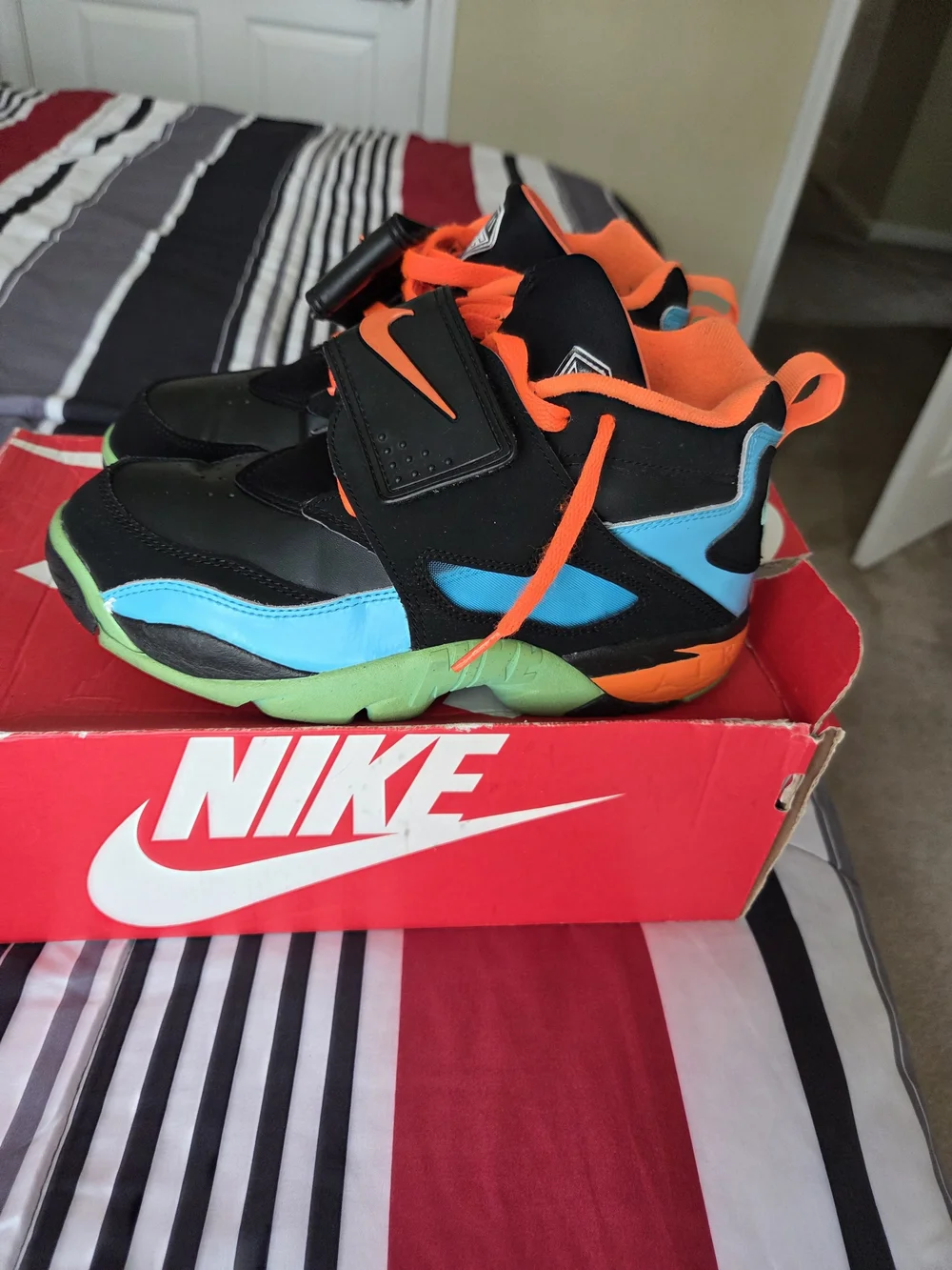 Nike Kids Black & Orange Athletic Shoes with Blue and Green Accents